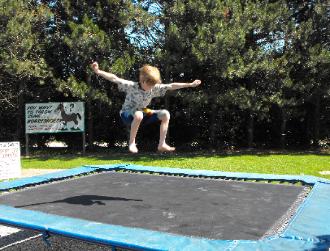 Kyle works the trampoline at Greenview