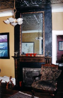 fireplace under tin ceiling