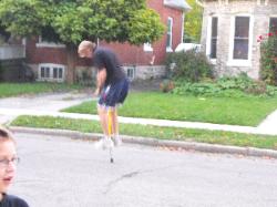 Dennis manages a couple of bounces on the pogo - Debbie did 40!